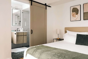 Bedroom 2 with king bed and en suite bathroom