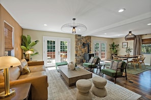 Whether you want to read, chat or watch tv this living area is cozy for them all