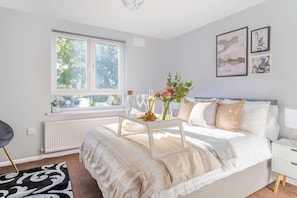 Comfortable double bedroom with fresh linen and towels provided.