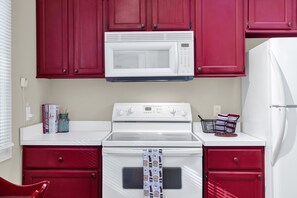 Rustic charm meets modern convenience in our fully stocked cottage kitchen