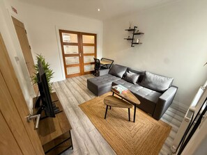 Zen-Inspired Lounge with Open Flow & Warm Tones