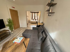 Flowing Space: Lounge into Restful Bedroom