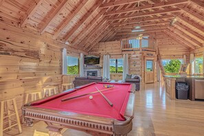 The Great Room offers soaring open spaces and sweeping mountain views from every angle.
