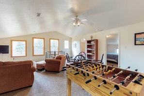 Game on in the upstairs loft — foosball fun for everyone.