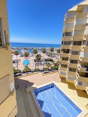 The third pool is at a lower floor (you can it from your balconies)