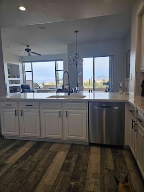 Kitchen view into living room