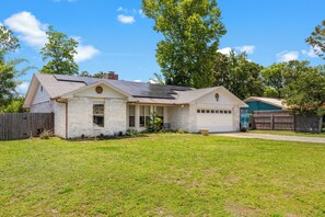 Charming single-story home with a spacious front yard and private driveway. Tucked in a quiet neighborhood with mature trees, this welcoming retreat offers plenty of room to relax both inside and out.