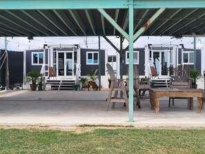 View of Outdoor Living and Entry to each Cabin