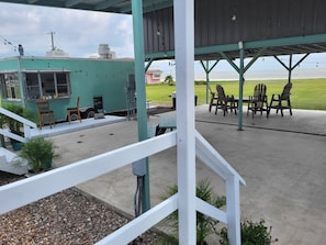 View of Outdoor Living & Kitchen (the Pearl) from Cabin 1 Porch