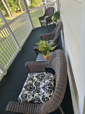 Lovely seating arrangements on the oversized balcony with an exquisite view 