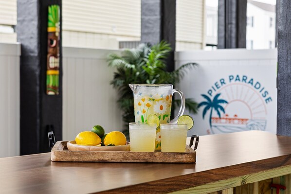 Escape to our brand-new Tiki Hut and outdoor fun zone — fully covered for rainy days, and packed with tropical vibes, games, and good times no matter the weather.