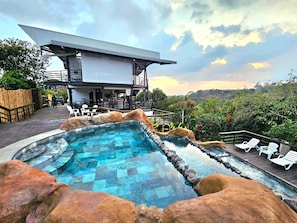 Waterfall pool by reception and bar & Restaurant