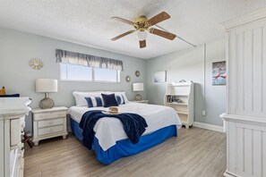 The master bedroom boasts a comfortable king-sized bed