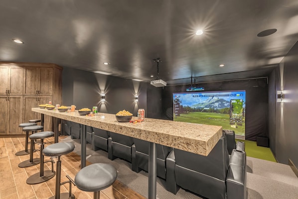 Golf/Sports Simulator and theater room. Everyone's favorite hangout room.
