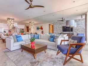Living room — Spacious living area with smart TV and comfortable seatings