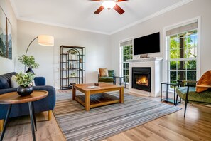 Main Level - Living Area w/ Gas Fireplace and Smart TV