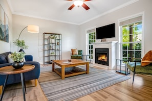 Main Level - Living Area w/ Gas Fireplace and Smart TV