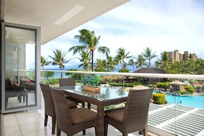 HKH-203 Serene primary suite with plush king bed and lanai access.