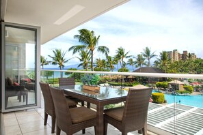 HKH-203 Serene primary suite with plush king bed and lanai access.