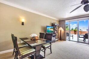 HKH-229 Bright living area with balcony access and garden views.
