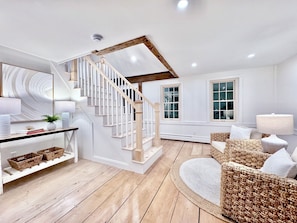 Entry way with sitting area.