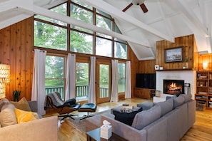 Charming A-frame design with large windows that fill the space with natural light and offer beautiful views.