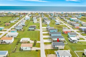 You will be 2 blocks from the beach. Beach toys and a wagon are provided. 