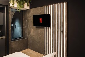 Enjoy smart entertainment from the heart of the suite.