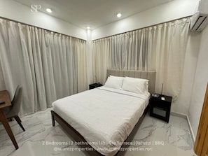 Main bedroom is powered by Alexa, an AC, a workstation, and an ensuite bathroom.