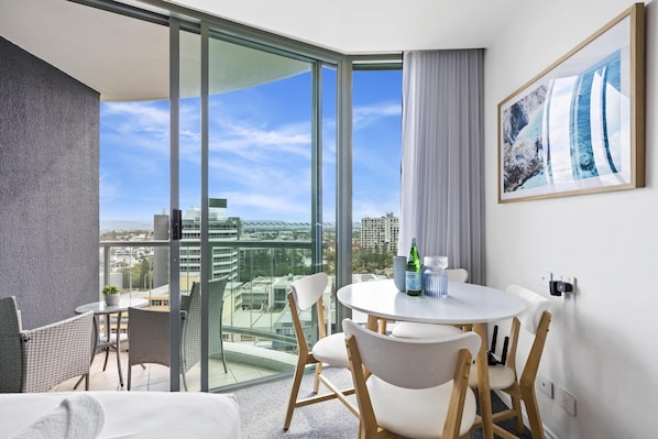 Dining area is right next to the balcony