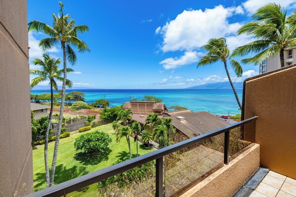 Gaze out over crystal-blue waters and island sunsets from this spacious private lanai in West Maui's premier resort area.