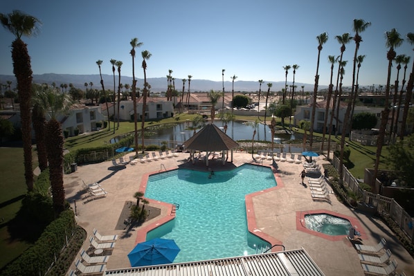 Take a refreshing dip in the shared pool or soak in the hot tub, all while enjoying the breathtaking scenery of palm trees and mountains at your doorstep.