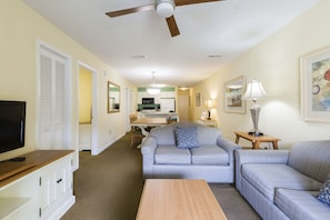 Experience open-concept living in the airy lounge and dining area, equipped with cable and streaming TVs for your entertainment.