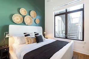 The primary bedroom features a king bed and an ensuite bathroom.
