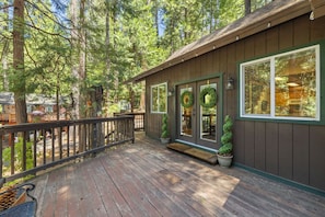 Sip your morning coffee on the front deck and take in the peaceful, woodsy charm of Sierra Park—double doors open wide for fresh mountain air.