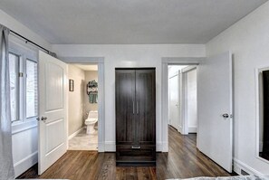 Another view of the bedroom with the en suite bathroom