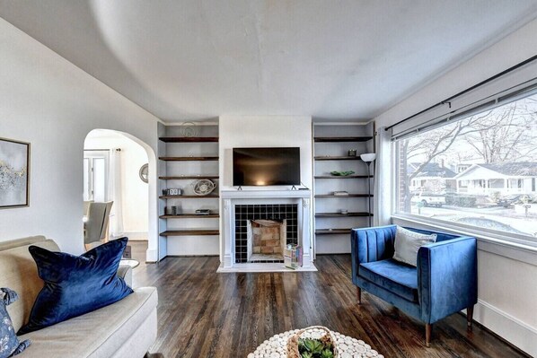 Beautifully designed living space featuring a pullout queen bed