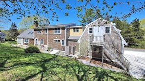 Spacious home set on a lovely yard with mature plantingss