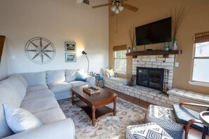 Smart TV and sectional in living area