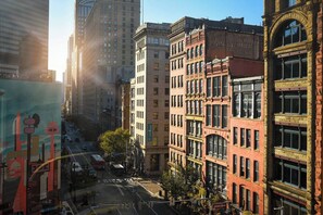 Building offers city views and a vibrant street view.