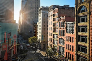 Building offers city views and a vibrant street view.
