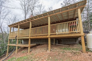 A view of the covered deck at Boogie Bear, a 1-bedroom cabin rental located in Gatlinburg