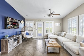 Cozy up in the bright, open living room
