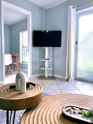 Smart TV and plenty of natural light in the living room