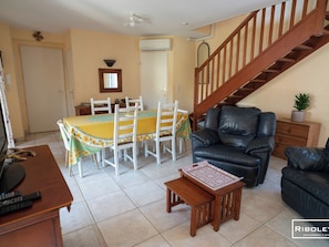 Dining room open to living room and outside area