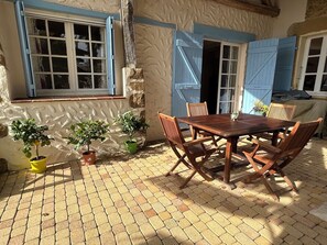 Separate outdoor space for dining. 