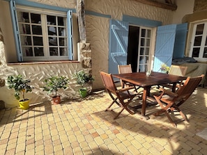 Separate outdoor space for dining.