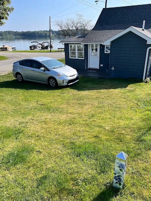 Free parking is in the yard behind the cottage.