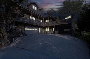 The driveway is perfect for multiple vehicles.