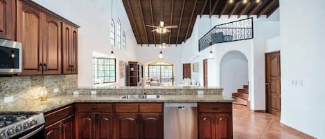 You'll love the open layout with vaulted ceilings and charming loft stairs.